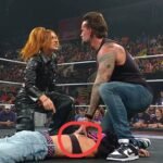 Becky Manhandle slams AJ Lee. Becky slaps CM Punk.