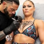BREAKING NEWS ⚠️ Ronda Rousey Gets Tattoos Made Near Roman Reigns?!