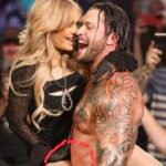 In the shadows of forgotten kingdoms, where time knelt before ruin and ash whispered ancient curses, two figures walked the edge of prophecy—Scarlett and Karrion.