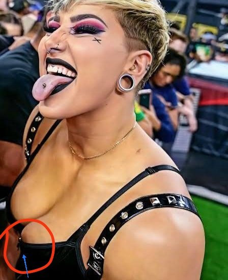 rhea ripley Embraced when she noticed her b**bs pin out form shart OMG