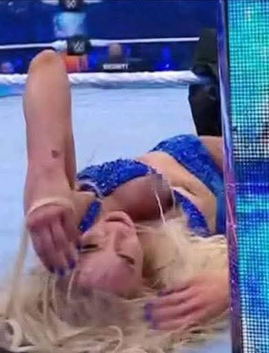 FLAIR NIGHTMARE WWE forced to cut live TV to black as Charlotte Flair suffers wardrobe malfunction during Wrestlemania 38